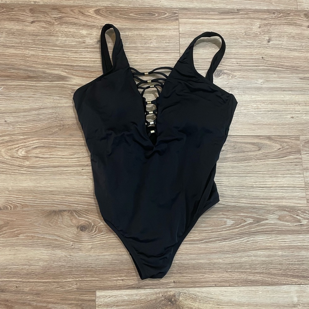 Apt. 9 - Black one piece, bathing suit with crisscross and gold details.
